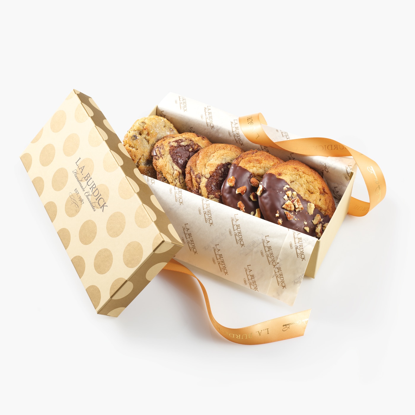Five freshly baked cookies wrapped inside a gift box and tied with a bow.